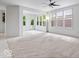 Living room featuring large windows and an open layout at 16573 Cava Dr, Fishers, IN 46037