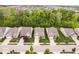 A street view displays homes with manicured lawns and charming curb appeal in a friendly neighborhood at 16573 Cava Dr, Fishers, IN 46037