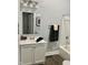 Clean and functional bathroom featuring a vanity, mirror, sink, bathtub, and modern fixtures at 1661 S Talbott St, Indianapolis, IN 46225