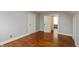 Bedroom features hardwood floors, neutral paint color and two closets at 1661 S Talbott St, Indianapolis, IN 46225