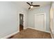 Cozy bedroom with natural light, ceiling fan and closet at 1661 S Talbott St, Indianapolis, IN 46225
