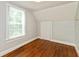 Bedroom features hardwood floors, closet and natural light at 1661 S Talbott St, Indianapolis, IN 46225