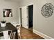 Dining room featuring art, a dining table, and doorway into another room at 1661 S Talbott St, Indianapolis, IN 46225