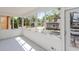 Bright sun room with expansive windows offering street views and natural light at 1661 S Talbott St, Indianapolis, IN 46225