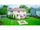 Expansive backyard with patio and fire pit, perfect for outdoor gatherings and relaxation at 18915 Fairfield Blvd, Noblesville, IN 46060
