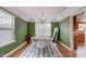 Dining room with modern chandelier and ample natural light at 18915 Fairfield Blvd, Noblesville, IN 46060