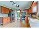 Functional kitchen with stainless steel appliances and ample cabinet space at 18915 Fairfield Blvd, Noblesville, IN 46060