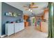 This kitchen features wood cabinets, stainless steel appliances, tile flooring, and a breakfast bar at 18915 Fairfield Blvd, Noblesville, IN 46060