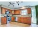 Well-equipped kitchen with stainless steel appliances and tile backsplash at 18915 Fairfield Blvd, Noblesville, IN 46060