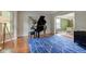 Elegant living room with hardwood floors and stylish blue rug at 18915 Fairfield Blvd, Noblesville, IN 46060