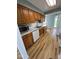 This kitchen features stainless steel appliances, modern countertops, and wooden cabinets at 1925 W State Road 32, Lebanon, IN 46052