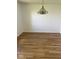 Bright living room with beautiful wood-look floors and white walls at 1925 W State Road 32, Lebanon, IN 46052