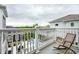 Relaxing balcony overlooking backyard pool and seating area at 2037 Stanhope St, Carmel, IN 46032