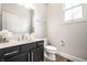Stylish bathroom with modern vanity, beautiful fixtures, and neutral tones at 2037 Stanhope St, Carmel, IN 46032