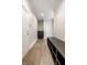 Inviting entryway features hardwood floors and a convenient built-in storage cabinet at 2037 Stanhope St, Carmel, IN 46032
