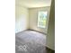 Bedroom with carpet and window at 3016 Wildcat Ln, Indianapolis, IN 46203