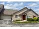 Charming single Gathering home features a well-maintained lawn and an attached two-car garage at 3016 Wildcat Ln, Indianapolis, IN 46203