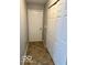Hallway with tile flooring and closet at 3016 Wildcat Ln, Indianapolis, IN 46203
