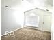 Cozy living room features neutral paint, carpet and natural light at 3016 Wildcat Ln, Indianapolis, IN 46203