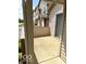 Covered patio with sliding glass door access to the interior at 3016 Wildcat Ln, Indianapolis, IN 46203