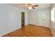 Spacious bedroom with hardwood floors, closet storage, and natural light at 3333 Melbourne S Rd, Indianapolis, IN 46228