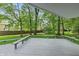 Outdoor deck overlooking lush backyard space for relaxing and entertaining guests at 3333 Melbourne S Rd, Indianapolis, IN 46228