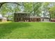 Charming two-story home with a well-manicured lawn and a combination of brick and siding exterior at 3333 Melbourne S Rd, Indianapolis, IN 46228