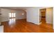 Spacious living area with hardwood floors and bright white trim throughout at 3333 Melbourne S Rd, Indianapolis, IN 46228