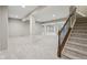 Finished basement with plush carpeting and supportive columns with decorative trim at 3744 Abney Point Dr, Carmel, IN 46077