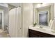 Modern bathroom featuring a vanity with white countertops and a shower with a white curtain at 3744 Abney Point Dr, Carmel, IN 46077