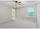 Bedroom with neutral paint, plush carpeting, ceiling fan and natural light from window at 3744 Abney Point Dr, Carmel, IN 46077