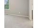 Corner of carpeted bedroom with a window and neutral walls, providing a cozy atmosphere at 3744 Abney Point Dr, Carmel, IN 46077