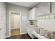 Mudroom with built-in storage, bench seating, and a convenient entryway at 3744 Abney Point Dr, Carmel, IN 46077