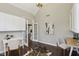 Bright home office featuring built-in cabinets, a desk, and vaulted ceilings at 3744 Abney Point Dr, Carmel, IN 46077