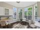 Bright office featuring a built-in desk and large windows offering plenty of natural light at 3744 Abney Point Dr, Carmel, IN 46077