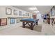 Finished basement featuring a pool table, bar area, and stylish decorations at 3823 Brigade Cir, Carmel, IN 46032