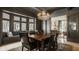 Elegant dining room featuring bay window seating and an open layout to the side room at 3840 N Washington Blvd, Indianapolis, IN 46205