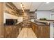 Basement bar area with rustic wood paneling and modern lighting at 4061 Secretariat Ln, Bargersville, IN 46106