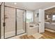 Bright bathroom featuring a separate shower and soaking tub next to a window with a view at 4061 Secretariat Ln, Bargersville, IN 46106