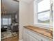 Open-concept view into the living room featuring stylish decor and natural light at 4061 Secretariat Ln, Bargersville, IN 46106
