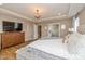 Spacious main bedroom featuring tray ceilings, a walk-in closet, and an en-suite bath at 4061 Secretariat Ln, Bargersville, IN 46106