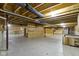 View of unfinished basement area with exposed wood beams, ductwork, and concrete floor at 4125 Sugar Pine Ln, Zionsville, IN 46077