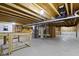 Unfinished basement showing mechanicals, exposed wood ceiling, and concrete flooring at 4125 Sugar Pine Ln, Zionsville, IN 46077