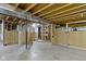Unfinished basement ready for customization, featuring concrete floor and exposed ceiling at 4125 Sugar Pine Ln, Zionsville, IN 46077