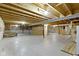Unfinished basement featuring exposed wood beams and concrete floors at 4125 Sugar Pine Ln, Zionsville, IN 46077
