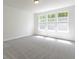 Bright bedroom featuring neutral carpeting, large windows, and lots of natural light at 4125 Sugar Pine Ln, Zionsville, IN 46077