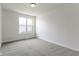 Bright bedroom with a window and neutral-toned carpeting at 4125 Sugar Pine Ln, Zionsville, IN 46077