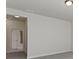 Neutral bedroom with doorways to the bathroom at 4125 Sugar Pine Ln, Zionsville, IN 46077