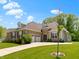 Attractive home with stone and siding, complemented by a well-kept lawn and garden at 4125 Sugar Pine Ln, Zionsville, IN 46077