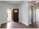 Bright entryway featuring hardwood floors and a view of the front exterior at 4125 Sugar Pine Ln, Zionsville, IN 46077
